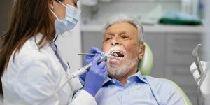 Senior man at the dentist